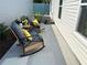 Relaxing patio area with rocking chairs, ideal for enjoying outdoor living and entertaining at 680 Joseph Way, The Villages, FL 34762