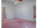 Bedroom featuring access to the bathroom at 712 Old Oaks Ln, Leesburg, FL 34748