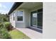 Enclosed patio with outdoor access through sliding glass doors at 7955 Delwin Ln, Reunion, FL 34747