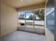 Enclosed patio with concrete flooring offering an outdoor space for relaxation or entertaining at 847 Cumberland Cir, Minneola, FL 34715