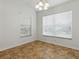 Bedroom with carpet and a light-filled window at 8601 Se 133Rd St, Summerfield, FL 34491