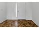 Clean entryway with modern white door and neutral tiled flooring, with great natural light at 8601 Se 133Rd St, Summerfield, FL 34491