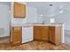 Kitchen counter with appliances, cabinets, and a view into the next room at 8601 Se 133Rd St, Summerfield, FL 34491
