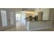 Lovely kitchen with stainless steel appliances, granite countertops, and a cozy breakfast nook at 8719 Kenmure Cv, Orlando, FL 32836