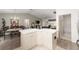 Bright kitchen island complemented by a dining area and cozy living space at 965 Eastmont Ct, The Villages, FL 32162