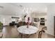 Open concept living space with dining area, kitchen, and living room at 965 Eastmont Ct, The Villages, FL 32162