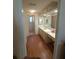 Bathroom featuring vanity with sink and access to the toilet and shower at 1005 Matthew Ave, Lady Lake, FL 32159