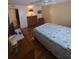 Comfortable bedroom with ceiling fan, dresser, and accents at 1005 Matthew Ave, Lady Lake, FL 32159