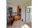 Storage room with shelving units, a desk and a utility door at 1005 Matthew Ave, Lady Lake, FL 32159