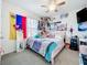 Bedroom featuring carpet, a ceiling fan, a bed, and a window with natural light at 1042 Lido Dr, Howey In The Hills, FL 34737