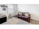 Upstairs living area with a comfortable couch and stylish decor at 1042 Lido Dr, Howey In The Hills, FL 34737