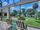 The Backyard offers a relaxing place to sit outside and enjoy the beautifully landscaped surroundings at 11226 Lane Park Rd, Tavares, FL 32778