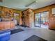 Functional garage with ample storage, utility sink, and access to outdoors at 11226 Lane Park Rd, Tavares, FL 32778