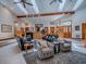 Spacious living room featuring comfortable seating, stylish area rug, and a welcoming ambiance at 11226 Lane Park Rd, Tavares, FL 32778