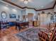 Beautiful office with hardwood floors, large built-in cabinets and trim, and large window seat at 11226 Lane Park Rd, Tavares, FL 32778