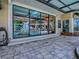 The large windows give great views of the enclosed pool at 11226 Lane Park Rd, Tavares, FL 32778