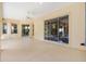 Expansive screened-in lanai with multiple windows and sliding glass doors offering seamless indoor-outdoor living at 1123 Barnacle Ter, The Villages, FL 32162