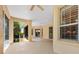 Spacious, covered lanai providing an open view of the backyard and access to various rooms through sliding glass doors at 1123 Barnacle Ter, The Villages, FL 32162