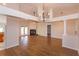 Bright living room featuring hardwood floors and fireplace at 11442 Beggs Ct, Clermont, FL 34711