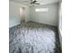 Inviting bedroom featuring contemporary flooring, natural light, and a calming ambiance at 13430 Sw 105Th Place, Dunnellon, FL 34432