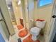 Full bathroom with a tub/shower combination, a toilet, and a vanity at 152 Dogwood Trl, Leesburg, FL 34748