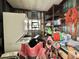 Functional storage room with shelving and essential appliances at 152 Dogwood Trl, Leesburg, FL 34748