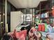 Functional storage room with shelving and essential appliances at 152 Dogwood Trl, Leesburg, FL 34748