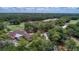 An aerial view of the golf course and surrounding lush green trees at 179 Birchmont Dr, Deland, FL 32724