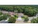Stunning aerial view of a home, lush landscaping, and a well-maintained lawn at 179 Birchmont Dr, Deland, FL 32724