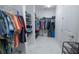 Spacious walk-in closet with custom shelving and racks at 179 Birchmont Dr, Deland, FL 32724