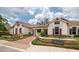 Victoria Hills Golf Club featuring a sign and an inviting entrance with beautiful landscaping at 179 Birchmont Dr, Deland, FL 32724