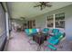 Outdoor patio with brick floors and seating area, great for entertaining at 179 Birchmont Dr, Deland, FL 32724