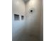 Tiled shower with built-in niche and modern fixtures at 1881 Sunshine Peak Dr, Minneola, FL 34715