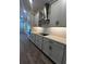 Modern kitchen design with stainless steel appliances, quartz countertops, and stylish backsplash at 1881 Sunshine Peak Dr, Minneola, FL 34715