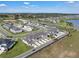 An aerial view of modern townhomes in a well-planned community at 2552 Chickasaw Plum Loop, Clermont, FL 34711