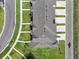 New townhome rooftop view with modern architectural design, enhancing curb appeal in a thriving community at 2552 Chickasaw Plum Loop, Clermont, FL 34711
