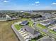 New residential neighborhood showcasing modern homes, green spaces, and well-planned streets at 2552 Chickasaw Plum Loop, Clermont, FL 34711