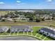 Charming townhomes feature well-maintained landscaping, a convenient location, and a desirable community setting at 2552 Chickasaw Plum Loop, Clermont, FL 34711