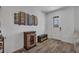 Inviting entryway featuring stylish decor, tile flooring, and a well-lit space at 2552 Chickasaw Plum Loop, Clermont, FL 34711