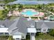 Aerial shot of community pool and recreational areas with mature landscaping at 2552 Chickasaw Plum Loop, Clermont, FL 34711