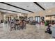 Spacious clubhouse with tables, chairs, and a beverage bar, perfect for community gatherings at 2602 Stargrass Cir, Clermont, FL 34715