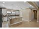Spacious kitchen featuring granite countertops, stainless steel appliances and recessed lighting at 2602 Stargrass Cir, Clermont, FL 34715