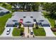 Charming residential property shows well-manicured lawns and paved driveways at 26030 Newcombe Cir, Leesburg, FL 34748