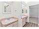 Bathroom featuring a vanity with a mirror at 26030 Newcombe Cir, Leesburg, FL 34748