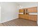 Dining room with built-in wooden cabinets and a decorative chandelier at 26030 Newcombe Cir, Leesburg, FL 34748