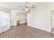 Bright living room with laminate flooring and lots of natural light at 26030 Newcombe Cir, Leesburg, FL 34748