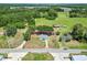 Aerial view of property with lush green surroundings and clearly marked property lines at 2845 County Road 523, Wildwood, FL 34785