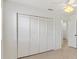 Bedroom with closet space and ceiling fan at 2845 County Road 523, Wildwood, FL 34785