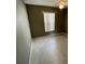 Cozy bedroom with ceramic tile flooring and neutral-toned walls at 3041 Bloomsbury Dr, Kissimmee, FL 34747