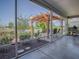 Relaxing screened lanai with an inviting pergola, perfect for outdoor entertaining and enjoying serene views at 3136 Vandenberg Ct, The Villages, FL 32163